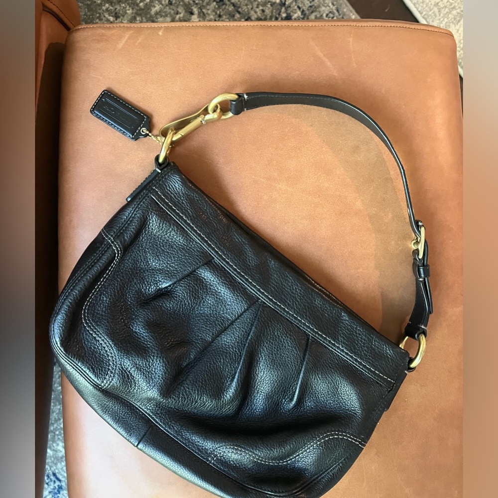 Coach handbag - soft black leather with purple silky interior. Great condition